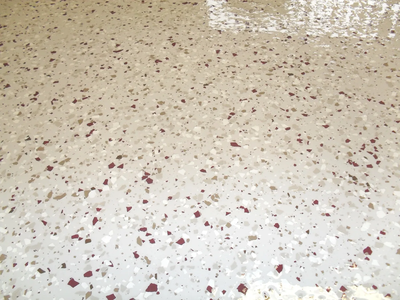 Decorative flake epoxy floor project by 1st Epoxy