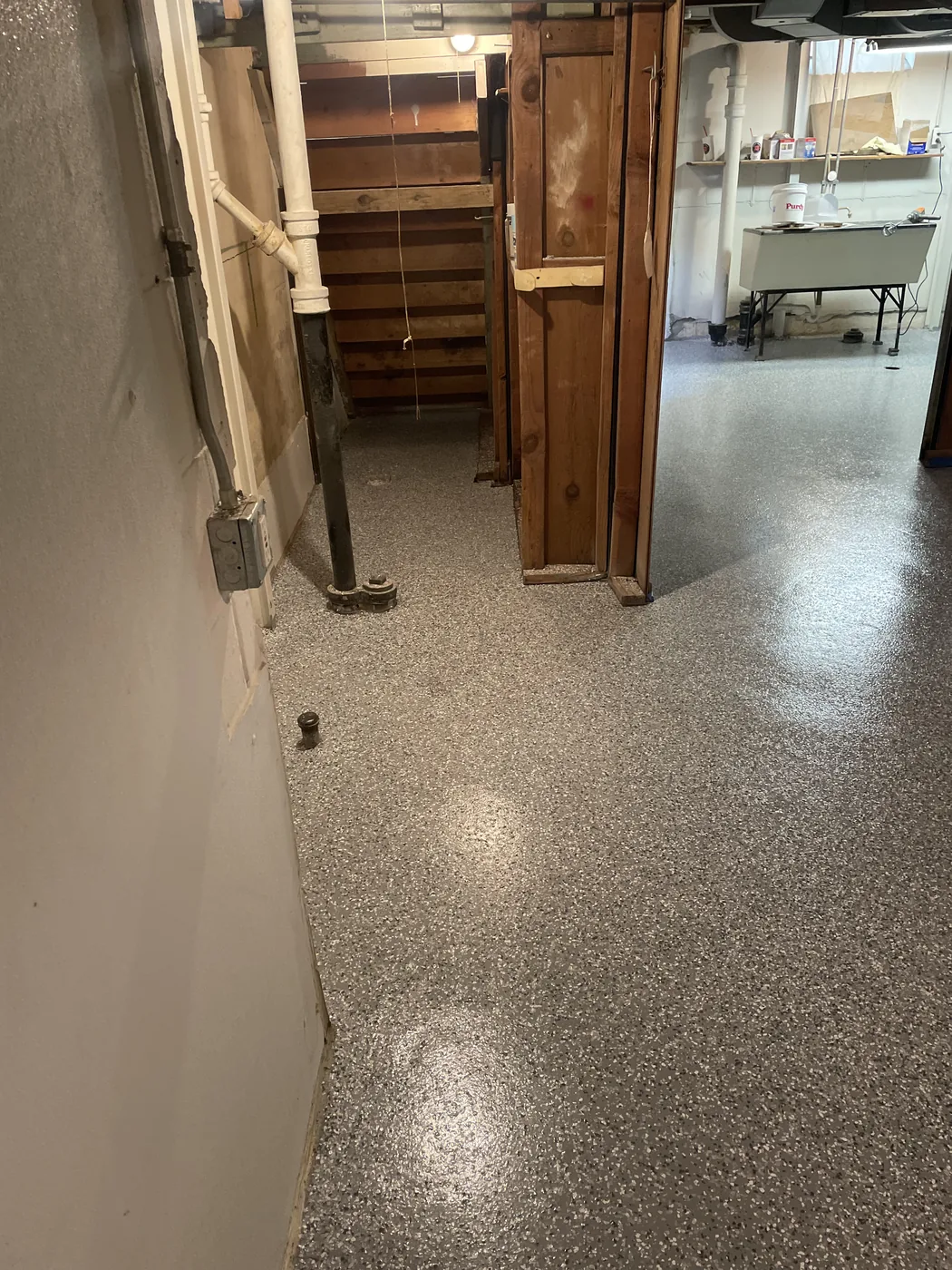 Decorative flake epoxy floor project by 1st Epoxy