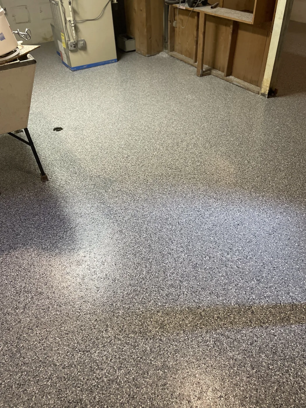 Decorative flake epoxy floor project by 1st Epoxy
