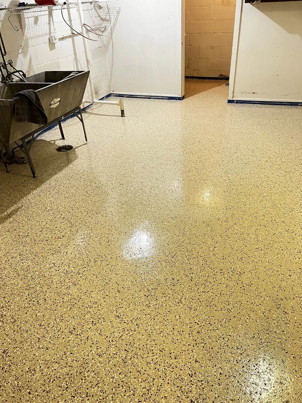 Decorative flake epoxy floor project by 1st Epoxy
