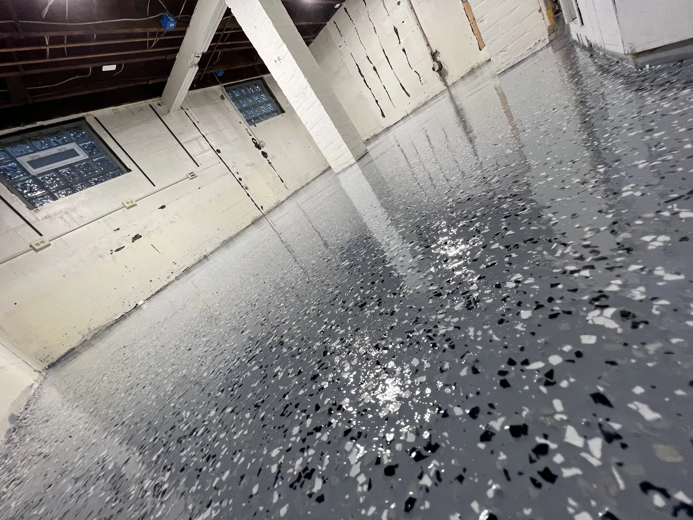 Decorative flake epoxy floor project by 1st Epoxy