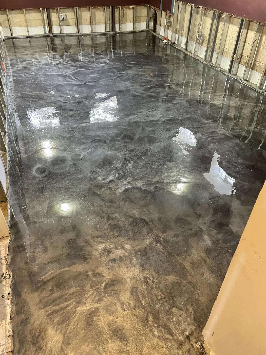 Decorative metallic epoxy floor project by 1st Epoxy