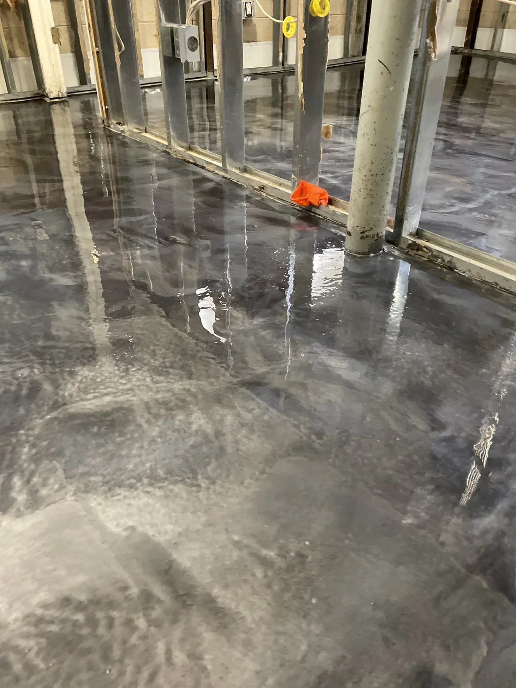 Decorative metallic epoxy floor project by 1st Epoxy